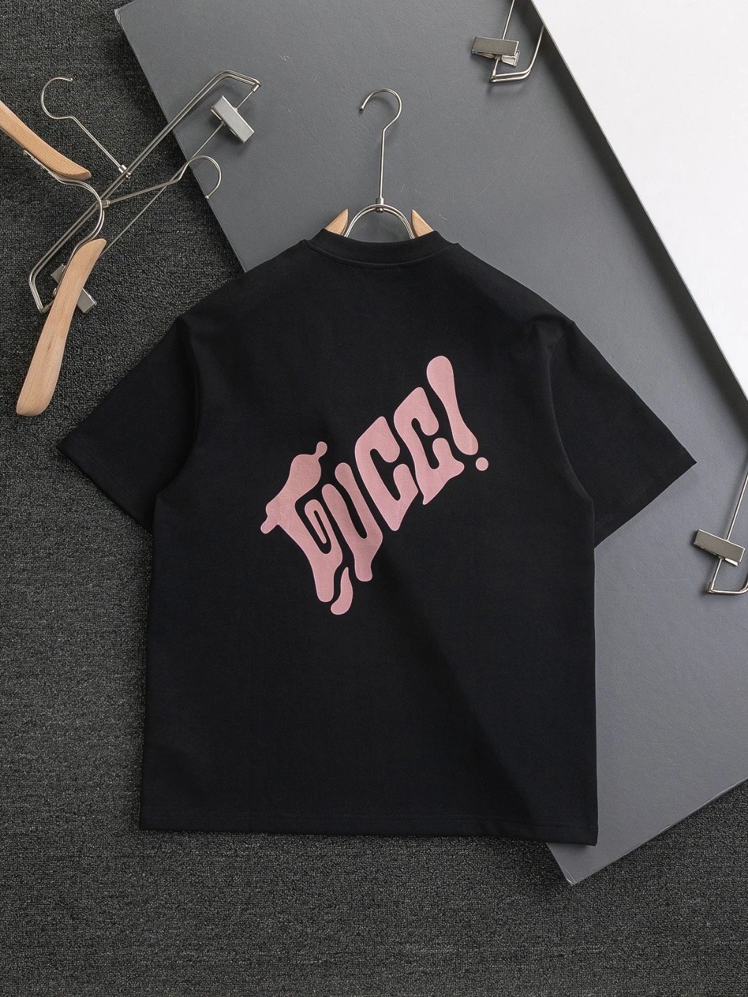 Gu*cci