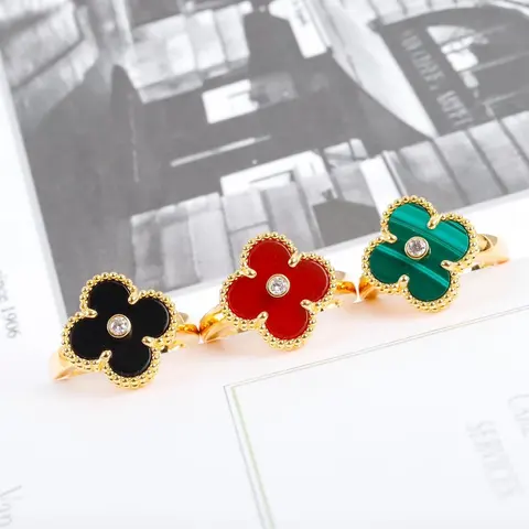 Four-Leaf Clover Rings in Black, Red, and Green with Crystal Center
